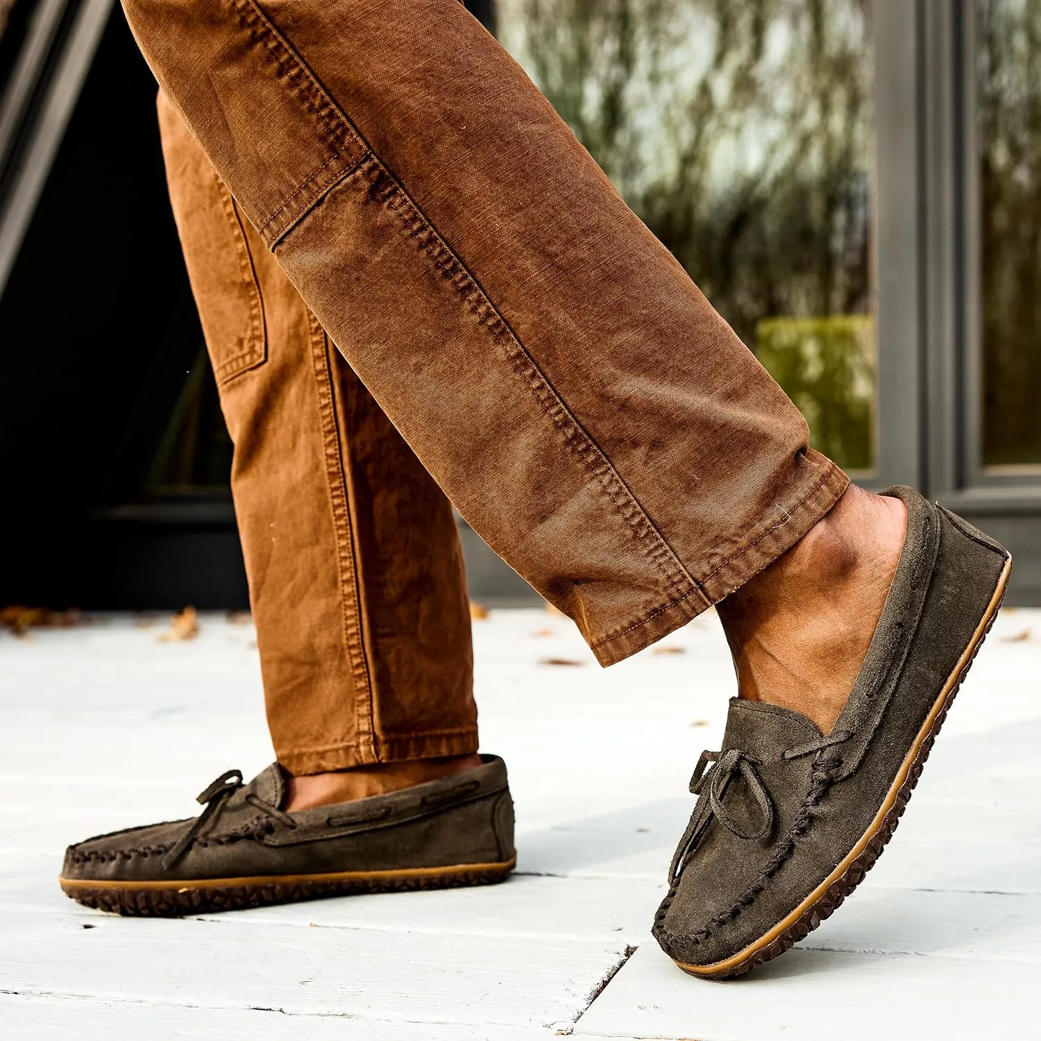 Minnetonka Men's Tie Tread - Suede Mocassins for Men - Water-Resistant Indoor Outdoor Slippers with MinnTREAD Rubber Sole