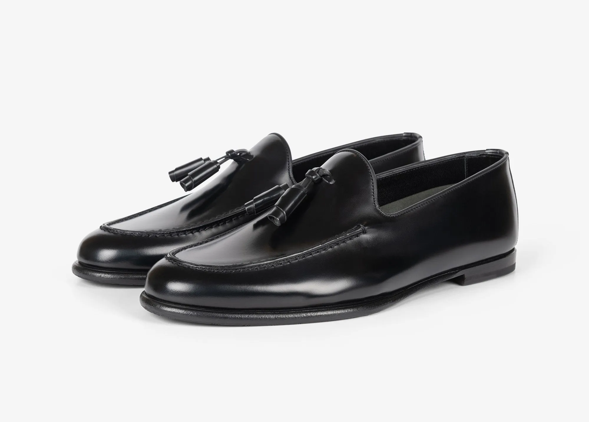 Mocassino con nappine in pelle spazzolata nera