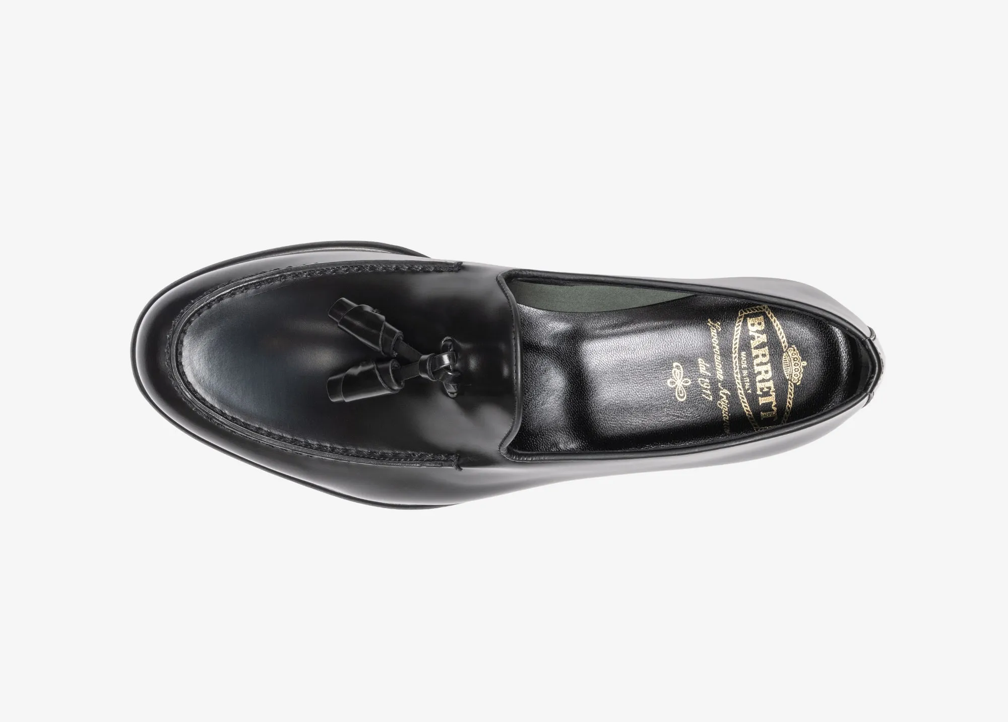 Mocassino con nappine in pelle spazzolata nera